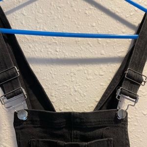 Black Overalls with stylish Holes in legs. Forever 21. Size Small